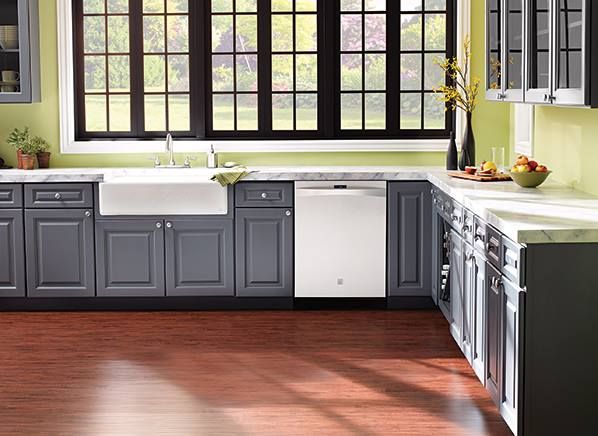 grey cabinets in kitchen with green walls